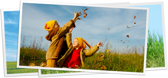 photo of children playing with leaves